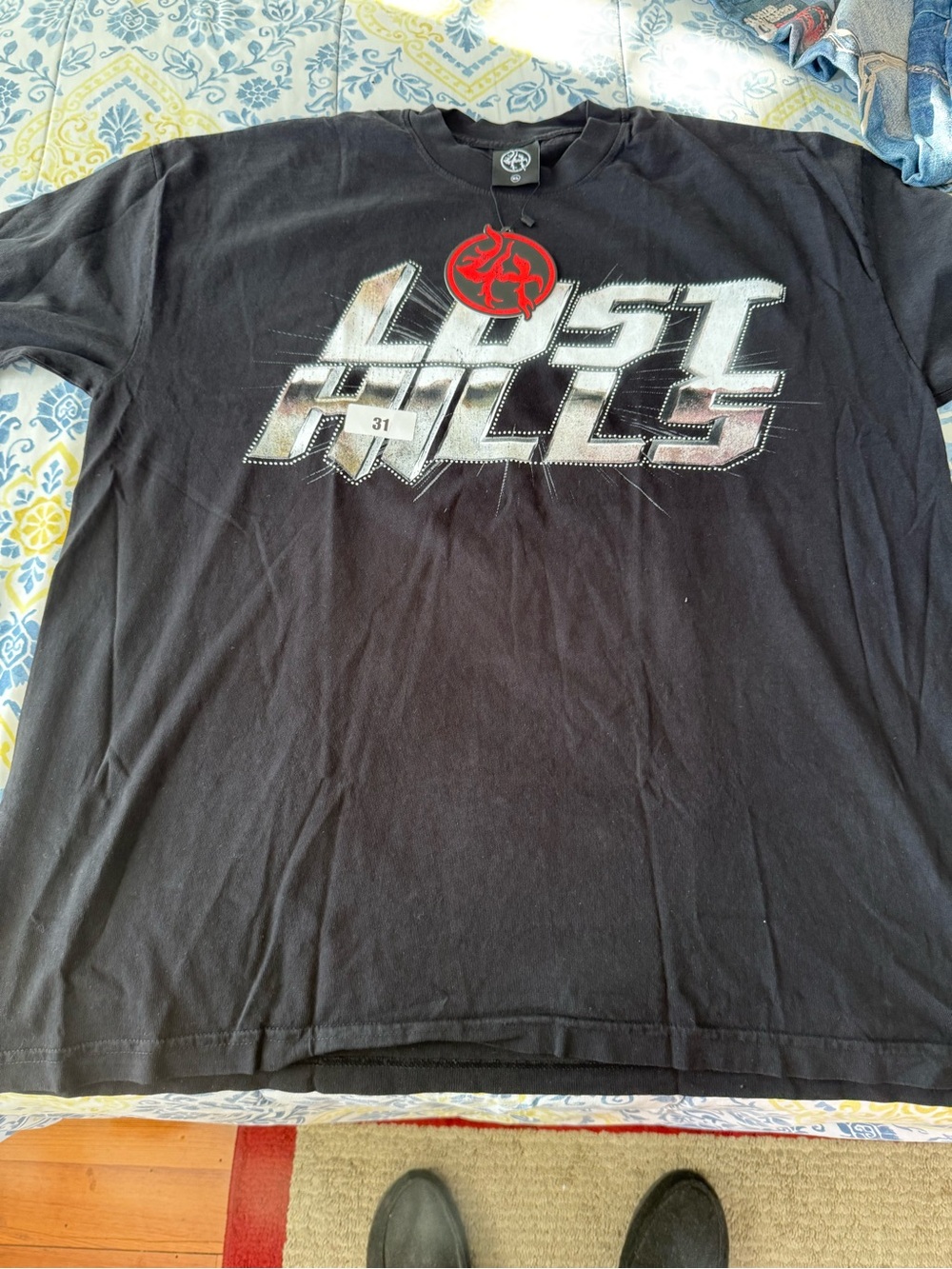 Lost Hills Men’s Black Graphic Tee with Red Flame Emblem